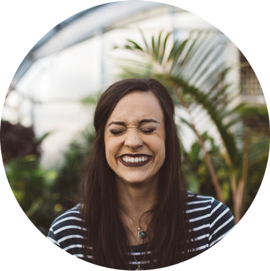 White woman smiling with her eyes closed