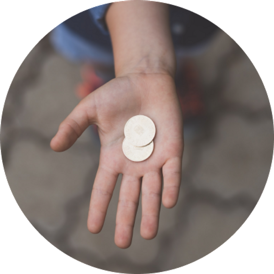 Open hand showing two coins