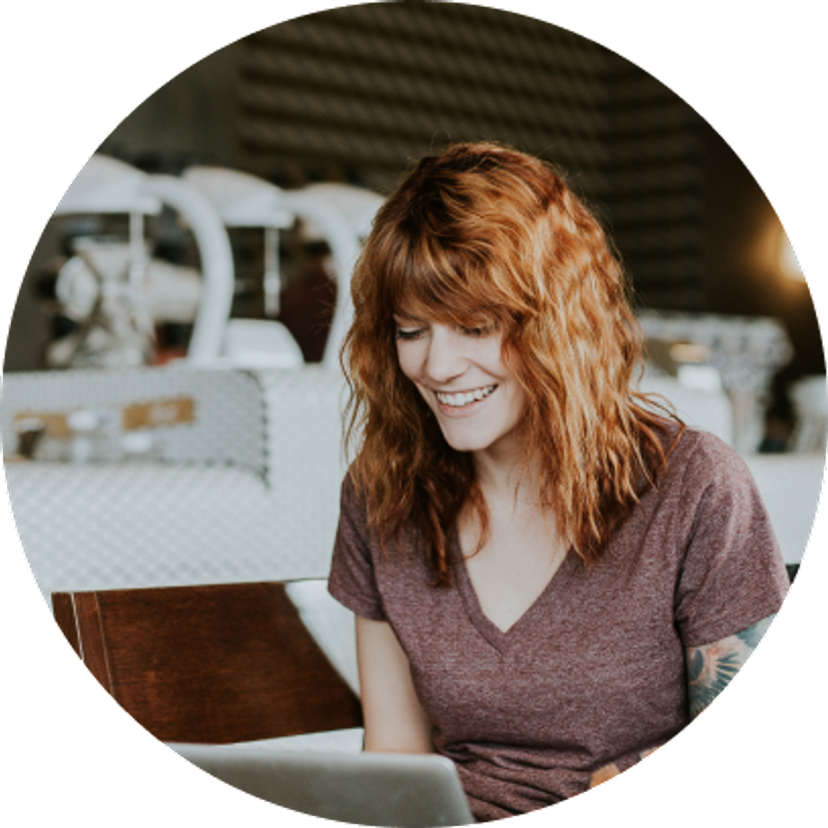 Red hair woman on a computer