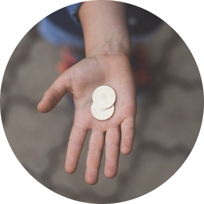 Open hand showing two coins